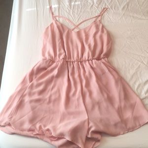 Pink romper- never worn! Even has pockets :)